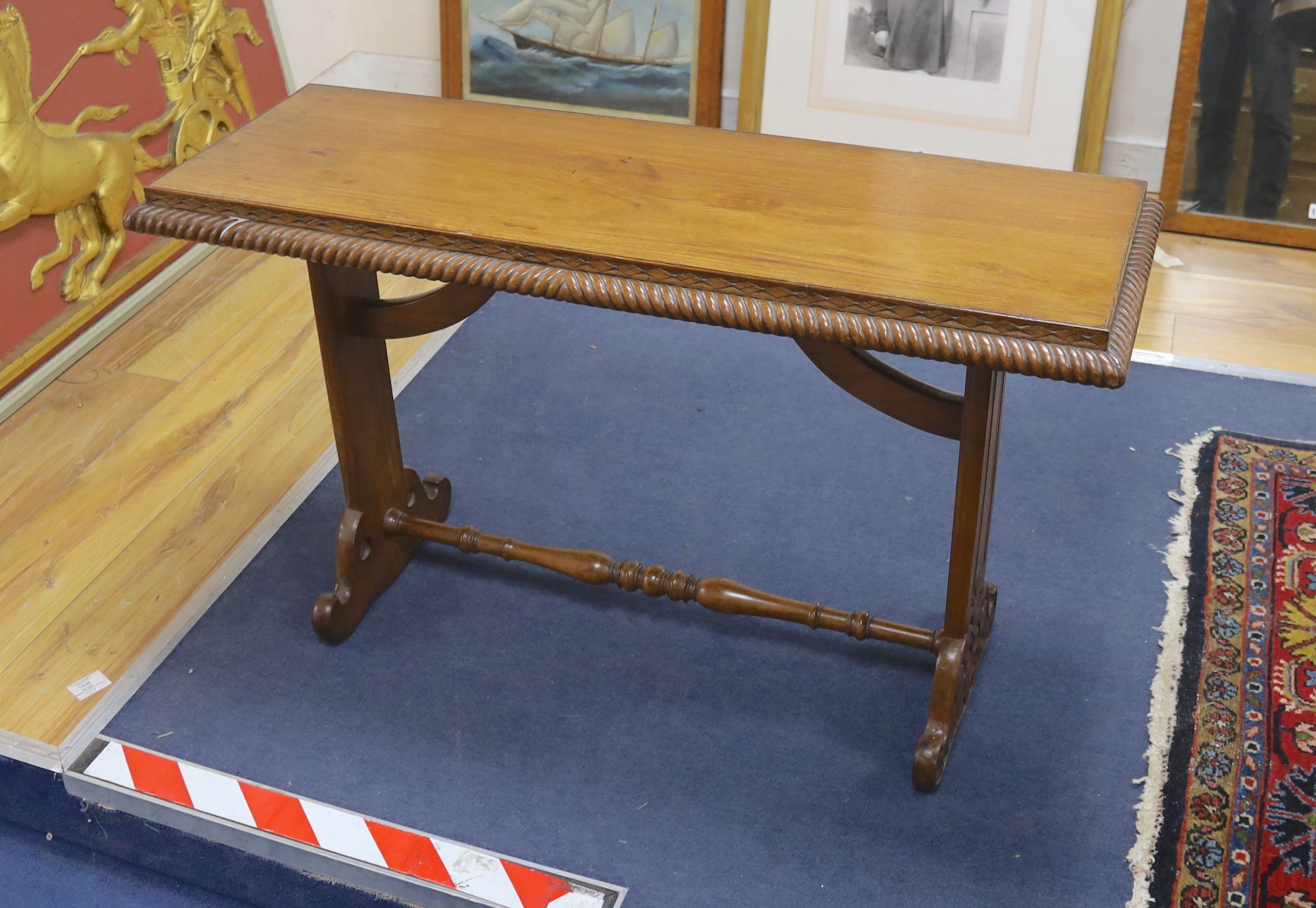 An early 19th century walnut window seat, length 95cm, depth 34cm, height 56cm